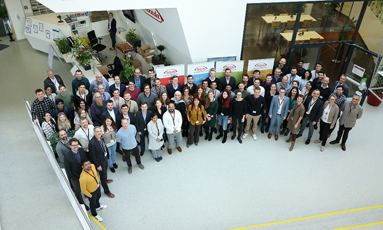 Figure 1 : Company coach, judges, work stream managers and Emerging Leaders and students in the Lobby at Takeda in Orth an der Donau