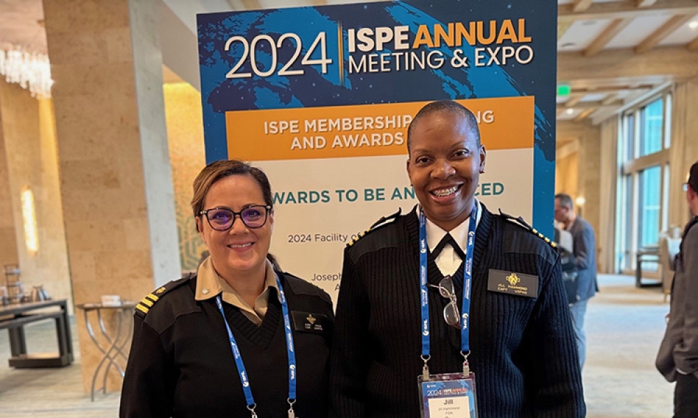 Commander June Page and Captain Jill Hammond pause for a photo at the 2024 ISPE Annual Meeting & Expo following their participation in ISPE’s Women in Pharma® workshop, “Adaptable Leadership.”